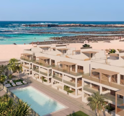 Immagine della prossima costruzione dell'edificio Cotillo Oasis di 59 appartamenti fronte mare a El Cotillo, Fuerteventura.